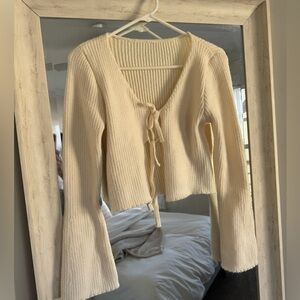 Open tied sweater